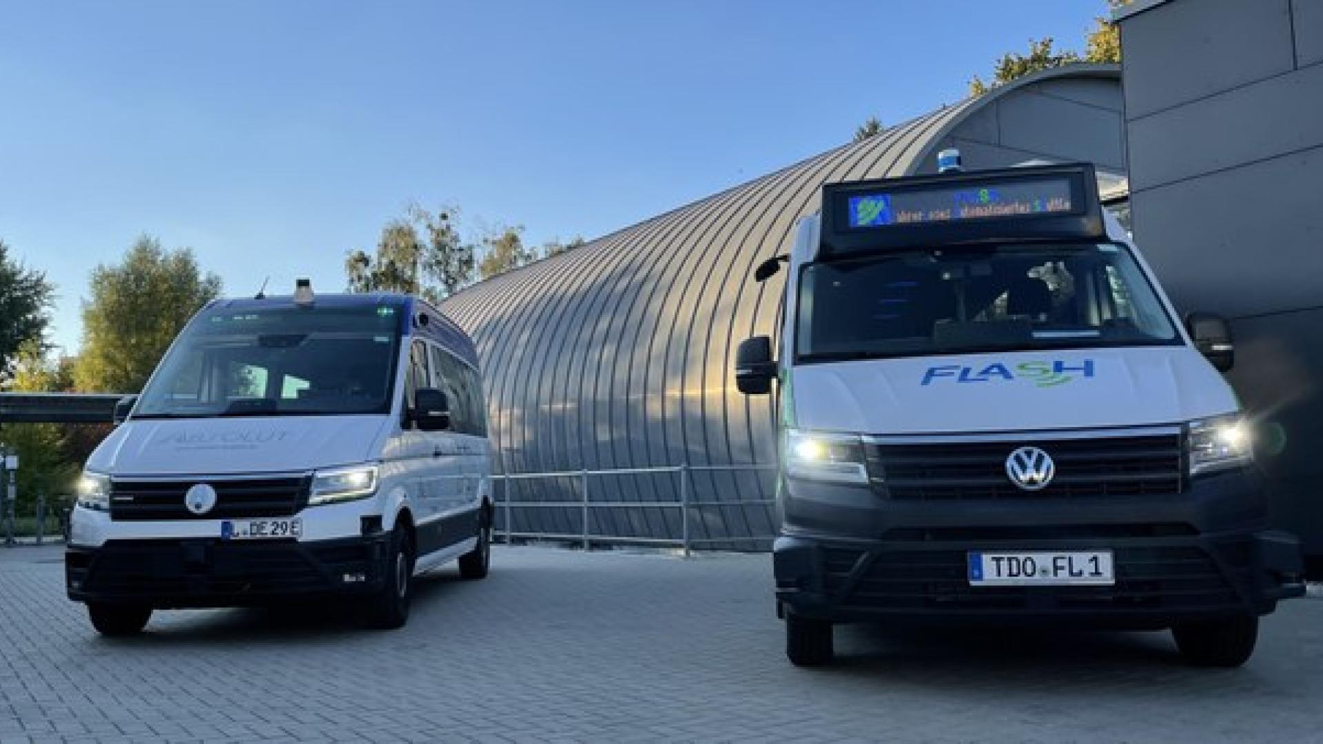 2 white vans