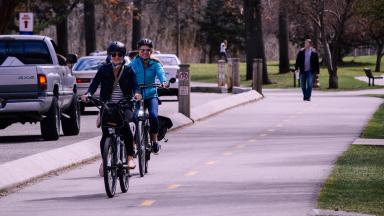 People on bicycles in a street