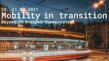 Tram runs through the city at night